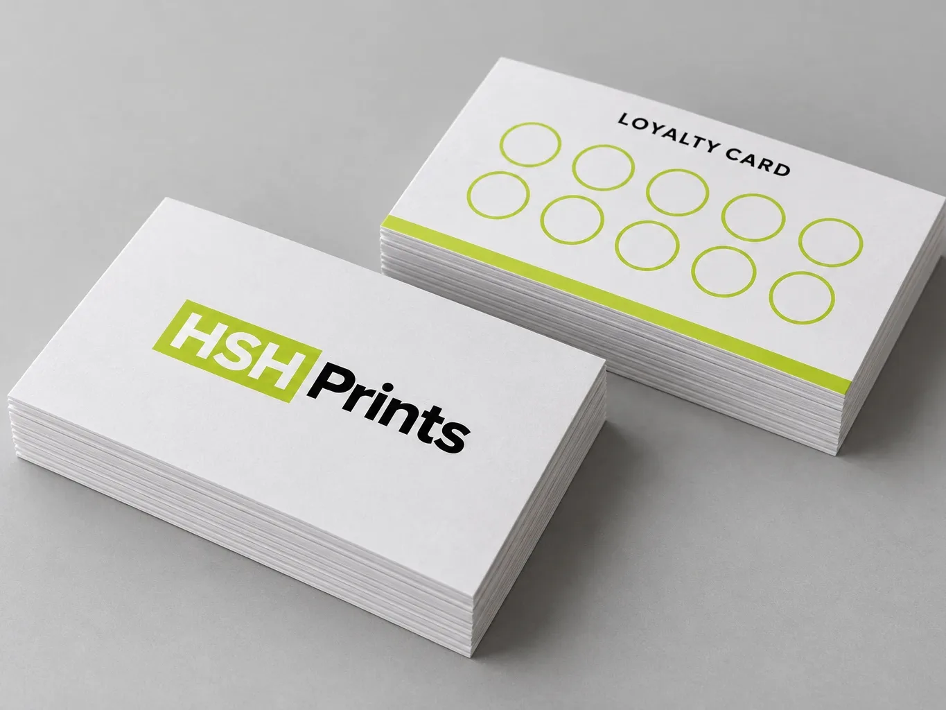 Mockup of two stacks of cards, one with the HSH logo and one a loyalty card with ten stamp circles